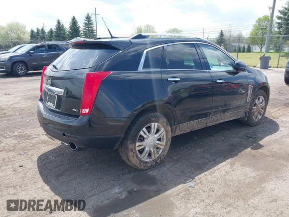 2014 Cadillac SRX Luxury Collection z VIN 3GYFNEE32ES659705, wystawiony jako IAAI lot #42148269 z przebiegiem 140 560 mil mil oraz . Historia ofert i sprzedaży dostępna na DreamBid. Obrazek 4.