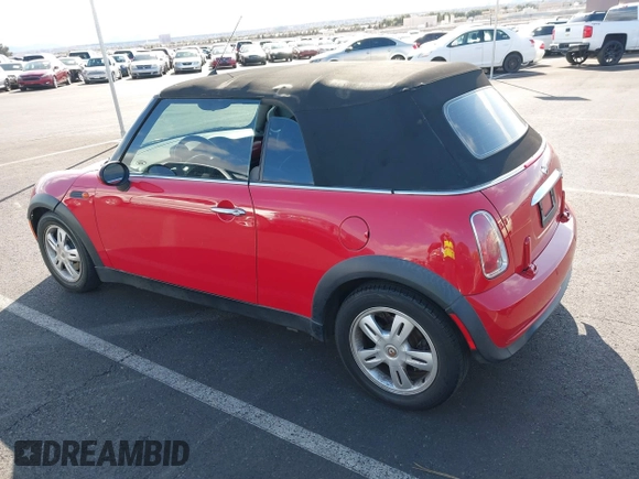 2007 MINI Convertible with VIN WMWRF33527TG17570, listed as a IAAI auction lot 41818884 with 103,447 mi miles and . Bid and sale history available at DreamBid. Image 3.