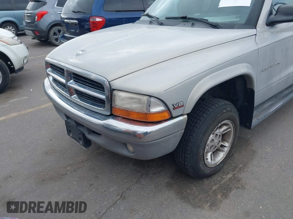 1999 Dodge Dakota SLT with VIN 1B7GG22YXXS255021, listed as a IAAI auction lot 41809325 with 204,352 mi miles and . Bid and sale history available at carsss.com. Image 6.