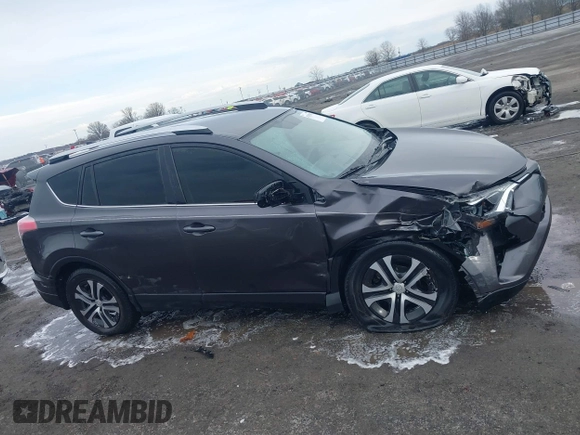 2016 Toyota RAV4 LE with VIN JTMZFREV5GJ093472, listed as a IAAI auction lot 41332037 with 212,869 mi miles. Bid and sale history available at carsss.com. Image 13.