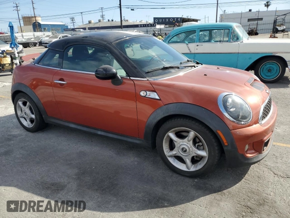 2013 MINI Coupe S z VIN WMWSX3C59DT466802, wystawiony jako Copart lot #56860965 z przebiegiem 88 053 mil mil oraz Szkoda całkowita • Salvage title. Historia ofert i sprzedaży dostępna na DreamBid. Obrazek 4.