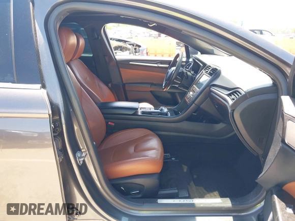 2020 Ford Fusion Titanium with VIN 3FA6P0K96LR173971, listed as a IAAI auction lot 42232469 with 82,474 mi miles and . Bid and sale history available at DreamBid. Image 5.