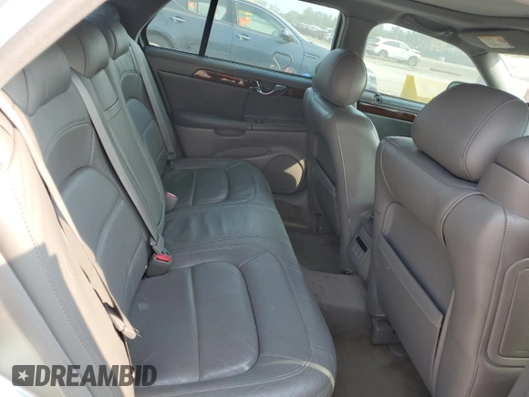 2004 Cadillac DeVille DTS z VIN 1G6KF57984U188454, wystawiony jako Copart lot #62397494 z przebiegiem 142 060 mil mil oraz Szkoda całkowita • Salvage title. Historia ofert i sprzedaży dostępna na DreamBid. Obrazek 10.
