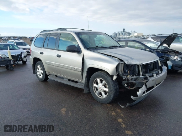 2003 GMC Envoy SLT with VIN 1GKDT13S532308502, listed as a IAAI auction lot 41676188 with 218,626 mi miles. Bid and sale history available at carsss.com. Image 1.