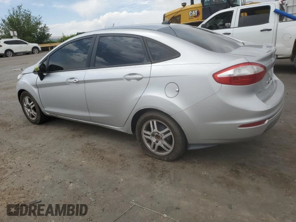 2014 Ford Fiesta SE z VIN 3FADP4BJ8EM133030, wystawiony jako Copart lot #52046065 z przebiegiem 113 792 mil mil oraz Szkoda całkowita • Salvage title. Historia ofert i sprzedaży dostępna na DreamBid. Obrazek 2.