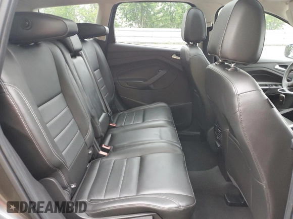 2015 Ford Escape Titanium with VIN 1FMCU9J93FUA67563, listed as a Copart auction lot 61770085 with 134,201 mi miles and Salvage title. Bid and sale history available at DreamBid. Image 11.
