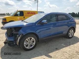 2020 Ford Edge SEL z VIN 2FMPK4J9XLBA11714, wystawiony jako Copart lot #60585555 z przebiegiem 101 593 mil mil oraz Szkoda całkowita • Salvage title. Historia ofert i sprzedaży dostępna na DreamBid. Obrazek 1.