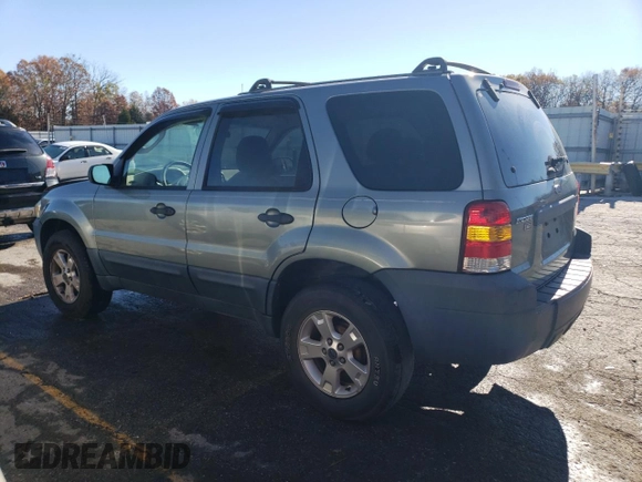 2006 Ford Escape XLT with VIN 1FMYU03Z16KD18123, listed as a Copart auction lot 79822934 with 169,309 mi miles and Salvage Title. Bid and sale history available at carsss.com. Image 2.