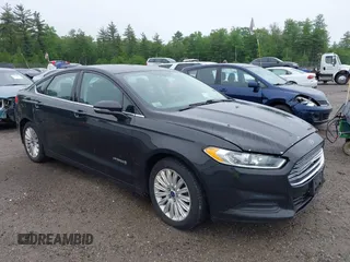 2014 Ford Fusion SE Hybrid with VIN 3FA6P0LU1ER371086, listed as a IAAI auction lot 42426185 with 242,235 mi miles and . Bid and sale history available at DreamBid. Image 1.