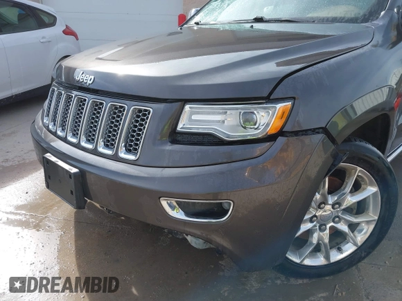 2015 Jeep Grand Cherokee Summit with VIN 1C4RJFJT1FC726330, listed as a IAAI auction lot 41781127 with 138,425 mi miles. Bid and sale history available at carsss.com. Image 17.