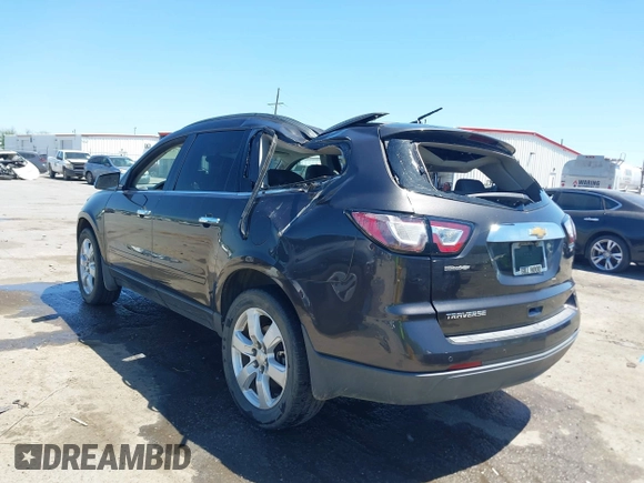 2017 Chevrolet Traverse LT with VIN 1GNKRGKD7HJ129888, listed as a IAAI auction lot 42009764 with 136,091 mi miles and . Bid and sale history available at DreamBid. Image 3.