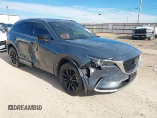 2022 Mazda CX-9 Grand Touring with VIN JM3TCBDY6N0613996, listed as a IAAI auction lot 41018105 with 58,110 mi miles. Bid and sale history available at carsss.com. Image 1.