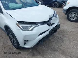 2017 Toyota RAV4 XLE with VIN JTMWFREV8HJ118885, listed as a IAAI auction lot 42097180 with 122,481 mi miles. Bid and sale history available at carsss.com. Image 18.