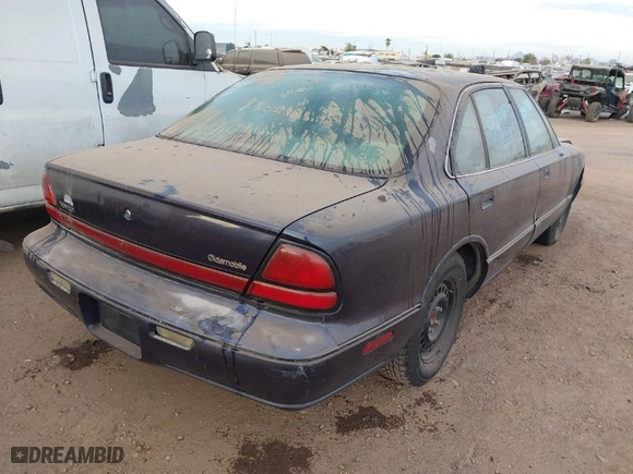 1999 Oldsmobile 88 LS with VIN 1G3HN52K6X4818867, listed as a IAAI auction lot 40958748 with NaN miles. Bid and sale history available at carsss.com. Image 4.