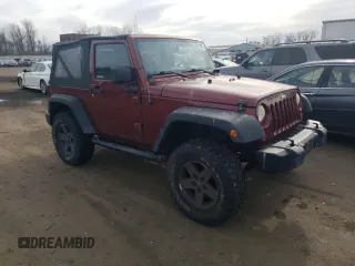 2007 Jeep Wrangler X with VIN 1J4FA24147L160102, listed as a Copart auction lot 52001105 with 219,939 mi miles and Clean Title. Bid and sale history available at carsss.com. Image 4.