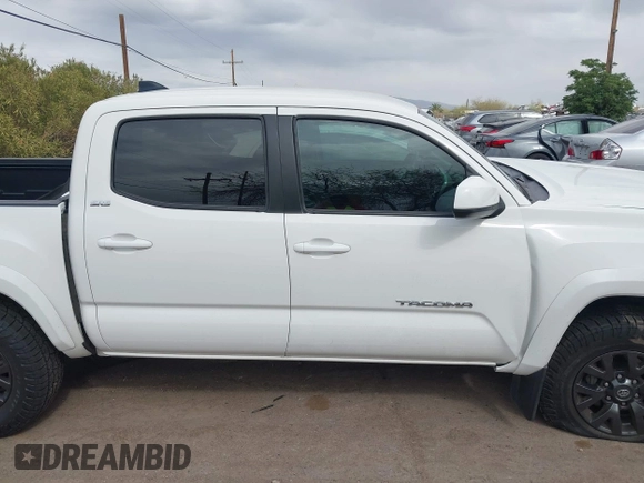 2021 Toyota Tacoma SR with VIN 3TYAX5GN6MT018475, listed as a IAAI auction lot 41966835 with 42,780 mi miles and . Bid and sale history available at DreamBid. Image 13.