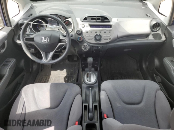 2009 Honda Fit with VIN JHMGE88229S049270, listed as a Copart auction lot 56935235 with 118,649 mi miles and Salvage title. Bid and sale history available at DreamBid. Image 8.