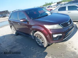 2011 Kia Sorento SX with VIN 5XYKWDA23BG100928, listed as a IAAI auction lot 42726001 with 346,471 mi miles and . Bid and sale history available at DreamBid. Image 1.