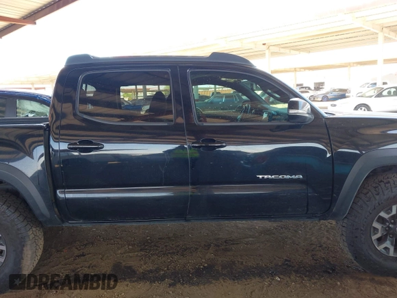 2017 Toyota Tacoma SR5 z VIN 3TMCZ5AN0HM110825, wystawiony jako IAAI lot #42297408 z przebiegiem 126 769 mil mil oraz . Historia ofert i sprzedaży dostępna na DreamBid. Obrazek 13.