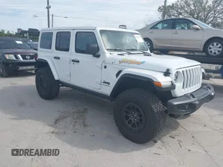 2023 Jeep Wrangler Sport S z VIN 1C4HJXDG5PW675463, wystawiony jako IAAI lot #41464572 z przebiegiem 3 379 mil mil oraz . Historia ofert i sprzedaży dostępna na DreamBid. Obrazek 1.