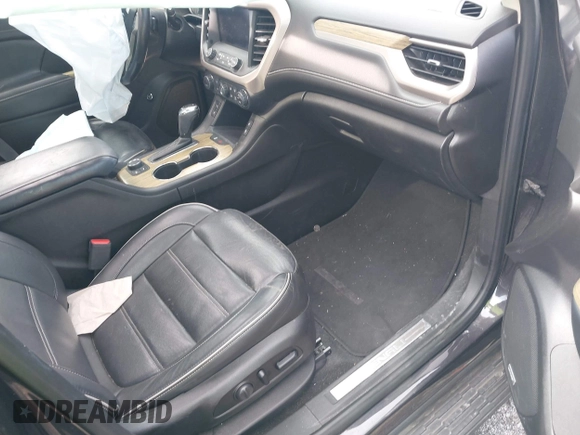 2019 GMC Acadia Denali with VIN 1GKKNXLSXKZ114736, listed as a IAAI auction lot 41679200 with 56,086 mi miles and . Bid and sale history available at carsss.com. Image 5.