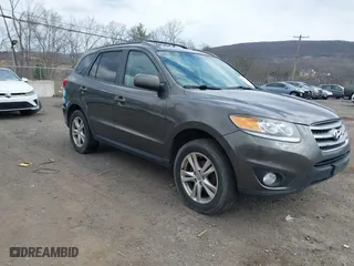 2012 Hyundai Santa Fe SE with VIN 5XYZHDAG9CG161996, listed as a IAAI auction lot 41820796 with 181,975 mi miles. Bid and sale history available at carsss.com. Image 1.