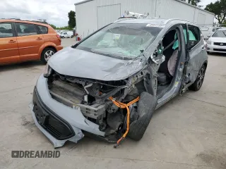 2020 Chevrolet Bolt EV Premier с VIN 1G1FZ6S03L4141473, выставлен на аукционе Copart как лот 54556515 с пробегом Не указан миль и Списание • Salvage title. История ставок и продаж доступна на DreamBid. Изображение 1.