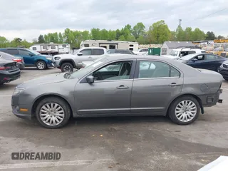 2011 Ford Fusion SE with VIN 3FAHP0HA1BR203046, listed as a IAAI auction lot 42011121 with 302,078 mi miles. Bid and sale history available at carsss.com. Image 15.