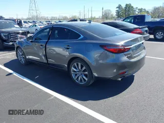 2020 Mazda 6 Grand Touring with VIN JM1GL1TY0L1522025, listed as a IAAI auction lot 41876429 with 68,101 mi miles and . Bid and sale history available at DreamBid. Image 3.