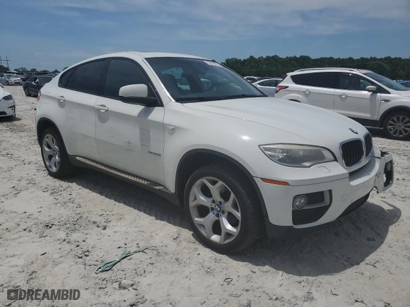 2014 BMW X6 xDrive35i with VIN 5UXFG2C53E0C44534, listed as a Copart auction lot 56518074 with 141,924 mi miles and Salvage Title. Bid and sale history available at carsss.com. Image 4.