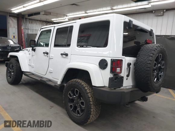 2017 Jeep Wrangler Unlimited Sahara with VIN 1C4BJWEG2HL700840, listed as a IAAI auction lot 42631036 with 60,610 mi miles and . Bid and sale history available at DreamBid. Image 3.