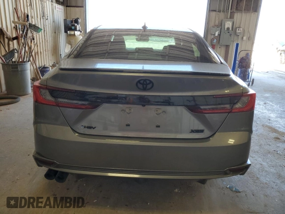 2025 Toyota Camry LE with VIN 4T1DAACKXSU556793, listed as a Copart auction lot 50574875 with 5,908 mi miles and Salvage Title. Bid and sale history available at carsss.com. Image 6.