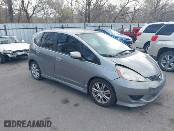 2009 Honda Fit Sport with VIN JHMGE884X9S045470, listed as a IAAI auction lot 41993638 with 181,198 mi miles. Bid and sale history available at carsss.com. Image 1.