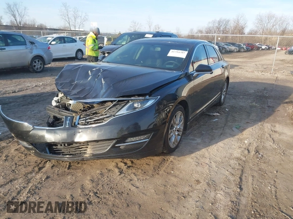 2015 Lincoln MKZ z VIN 3LN6L2J96FR619104, wystawiony jako IAAI lot #41794707 z przebiegiem 140 899 mil mil oraz . Historia ofert i sprzedaży dostępna na DreamBid. Obrazek 17.