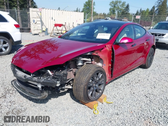 2023 Tesla Model S with VIN 5YJSA1E5XPF516779, listed as a IAAI auction lot 42110737 with 16,465 mi miles and . Bid and sale history available at DreamBid. Image 2.