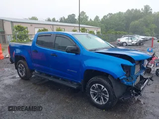 2022 Chevrolet Colorado 4WD Z71 z VIN 1GCGTDEN7N1124379, wystawiony jako IAAI lot #42372796 z przebiegiem 60 943 mil mil oraz . Historia ofert i sprzedaży dostępna na DreamBid. Obrazek 1.