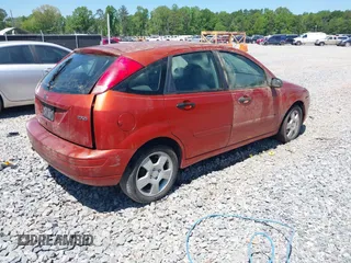 2005 Ford Focus S with VIN 3FAFP37N85R113281, listed as a IAAI auction lot 42037187 with Not Provided miles and . Bid and sale history available at carsss.com. Image 4.