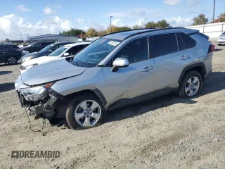 2019 Toyota RAV4 XLE with VIN 2T3W1RFV0KW036705, listed as a Copart auction lot 80983694 with 110,823 mi miles and Salvage Title. Bid and sale history available at carsss.com. Image 1.