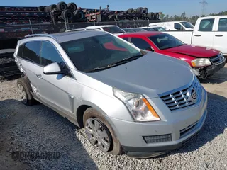 2015 Cadillac SRX Luxury Collection z VIN 3GYFNBE34FS523415, wystawiony jako IAAI lot #42055310 z przebiegiem 224 801 mil mil oraz . Historia ofert i sprzedaży dostępna na DreamBid. Obrazek 1.