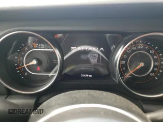 2022 Jeep Wrangler Unlimited Sahara with VIN 1C4HJXEG3NW248021, listed as a Copart auction lot 47555775 with 31,479 mi miles and Salvage Title. Bid and sale history available at DreamBid. Image 9.