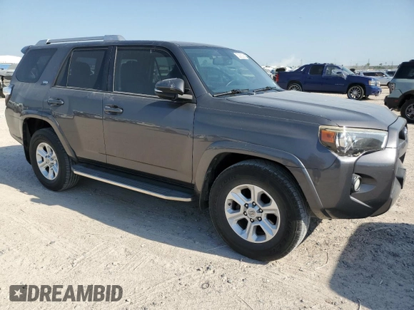 2014 Toyota 4Runner SR5 z VIN JTEZU5JR2E5077481, wystawiony jako Copart lot #52085385 z przebiegiem 114 482 mil mil oraz Czysty tytuł • Clean title. Historia ofert i sprzedaży dostępna na DreamBid. Obrazek 4.