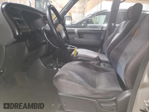 1999 Isuzu Trooper S z VIN JACDJ58X8X7915370, wystawiony jako Copart lot #83466824 z przebiegiem 143 588 mil mil oraz Czysty tytuł • Clean title. Historia ofert i sprzedaży dostępna na DreamBid. Obrazek 7.