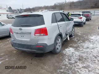2012 Kia Sorento EX with VIN 5XYKUDA20CG284796, listed as a IAAI auction lot 41414017 with 120,345 mi miles. Bid and sale history available at carsss.com. Image 4.