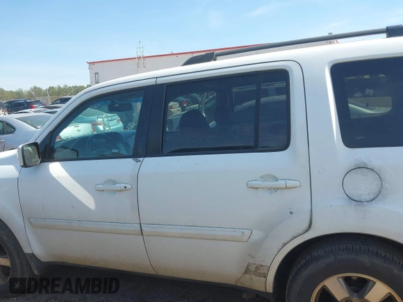 2011 Honda Pilot EX-L with VIN 5FNYF3H64BB027265, listed as a IAAI auction lot 41901424 with 198,556 mi miles and . Bid and sale history available at DreamBid. Image 14.