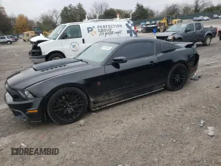 2013 Ford Mustang GT with VIN 1ZVBP8CF0D5206704, listed as a Copart auction lot 82353494 with 118,303 mi miles and Salvage title. Bid and sale history available at DreamBid. Image 1.