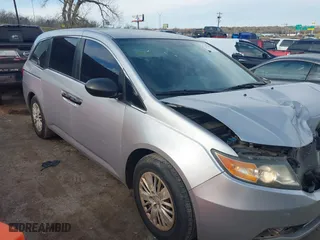 2015 Honda Odyssey LX with VIN 5FNRL5H27FB027143, listed as a IAAI auction lot 41239939 with 125,732 mi miles. Bid and sale history available at carsss.com. Image 1.