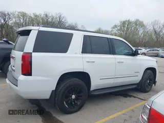 2016 Chevrolet Tahoe LT z VIN 1GNSKBKC8GR325630, wystawiony jako IAAI lot #41939244 z przebiegiem 177 948 mil mil oraz . Historia ofert i sprzedaży dostępna na DreamBid. Obrazek 13.