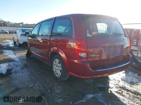2014 Dodge Grand Caravan American Value with VIN 2C4RDGBG6ER260219, listed as a IAAI auction lot 41516864 with 162,293 mi miles and . Bid and sale history available at DreamBid. Image 3.