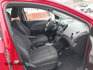 2012 Chevrolet Sonic LT with VIN 1G1JC5SH7C4133484, listed as a IAAI auction lot 42076809 with 100,506 mi miles and . Bid and sale history available at DreamBid. Image 5.