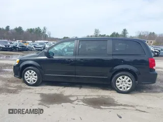 2017 Dodge Grand Caravan SE z VIN 2C4RDGBG3HR687183, wystawiony jako IAAI lot #41971615 z przebiegiem 158 201 mil mil oraz . Historia ofert i sprzedaży dostępna na DreamBid. Obrazek 14.